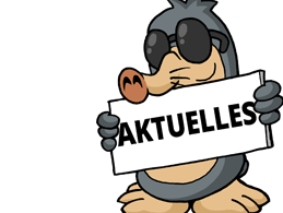 Maulwurf AUGust mit einem Schild "Aktuelles"