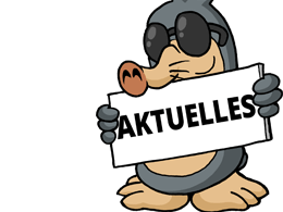 Maulwurf AUGust mit einem Schild "Aktuelles"